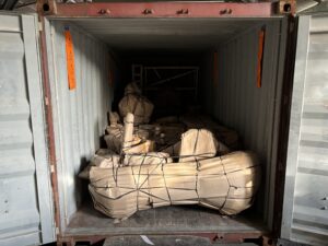 The customer's goods are packed into the container